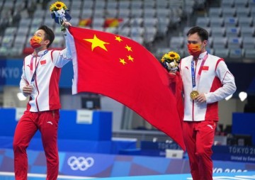 体育娱乐-3日综述：跳水体操国手喜添3金 田径赛场精彩刺激